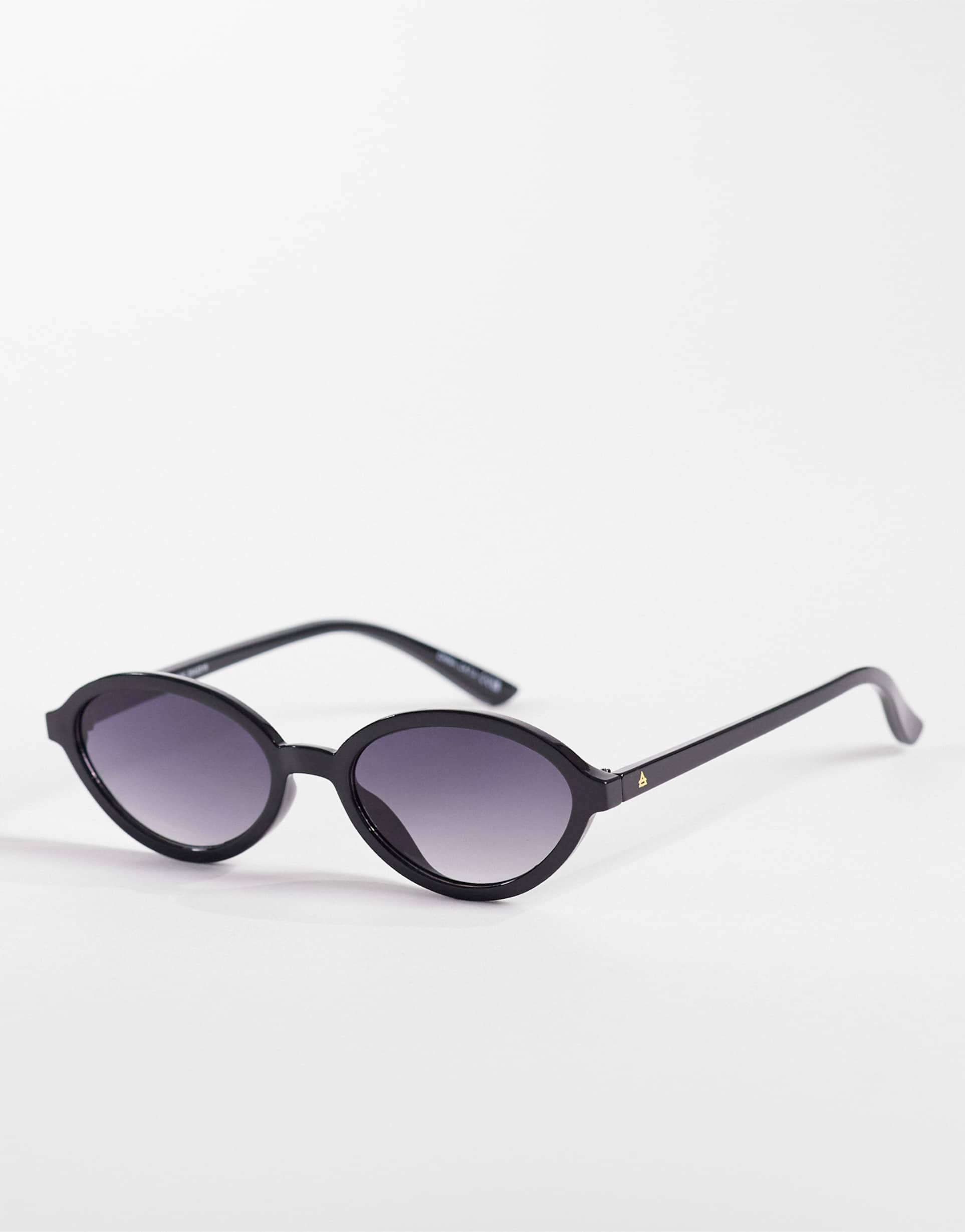 aire pyxis slim round sunglasses in black with gradient lens