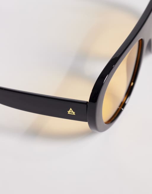 AIRE satellite shield sunglasses in black with amber tinted lens , 2 of 3