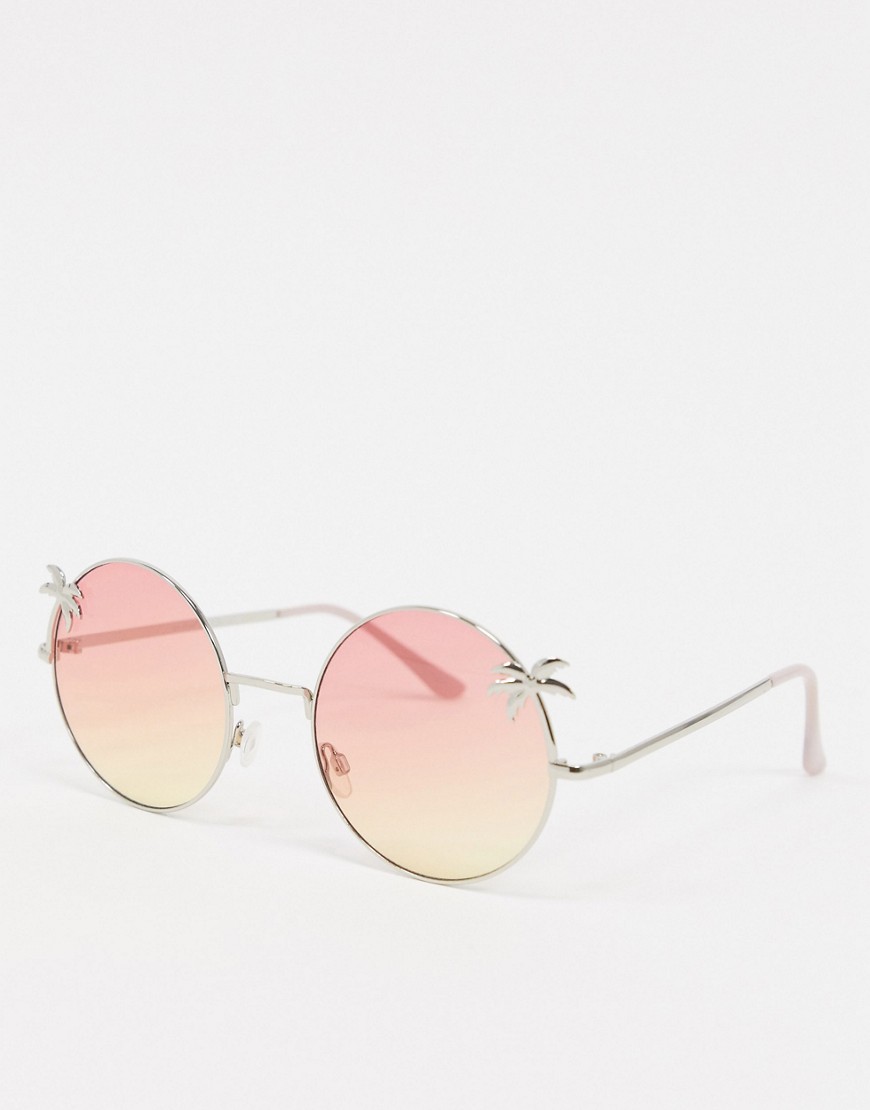 AJ Morgan – Rosa runda solglasögon med palmmönstrad detalj