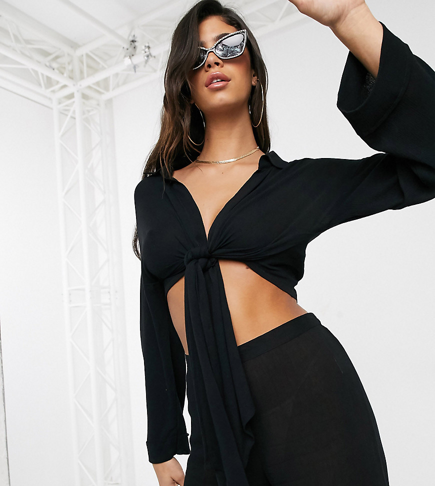 Akasa – Exklusiv svart strandklänning med knut framtill