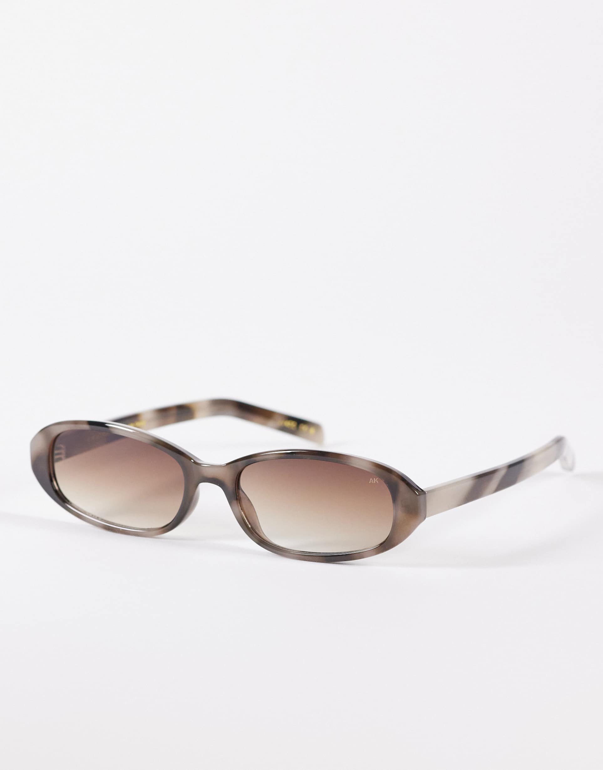 a.kjaerbede macy slim oval sunglasses in cookie dough