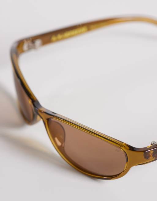 A.Kjærbede – Alexa – Schmale, ovale Cat-Eye-Sonnenbrille in transparenter Rauch-Optik, 2 von 3