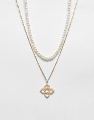ALDO 2 pack of necklaces with faux pearl and icon pendant in gold - ASOS Price Checker