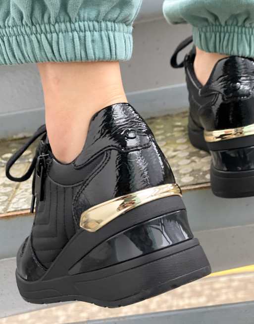 ALDO Adwiwia Sneakers met ritsdetail in zwart goud