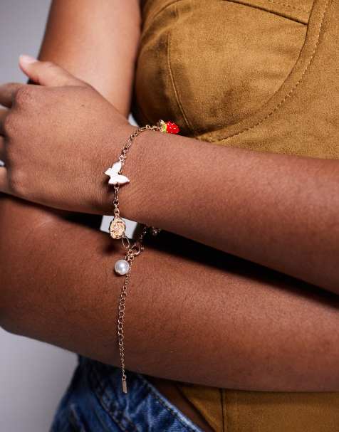 ALDO - Berrylove - Armband met madeliefjes en aardbei-hangertje in goud - view 1