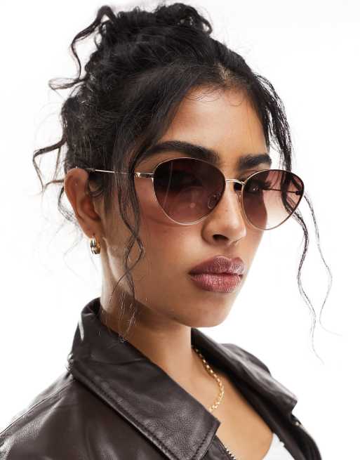 ALDO - Cat eye-solbriller med guldfarvet metalstel og brune glas