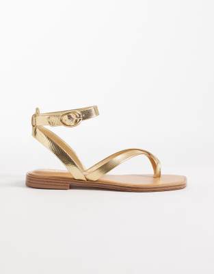 Aldo Daressi flip flop flats with ankle straps in gold gold