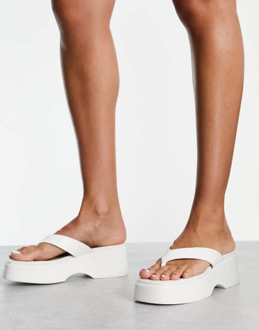 ALDO Delphy chunky flip flop sandals in off white ASOS