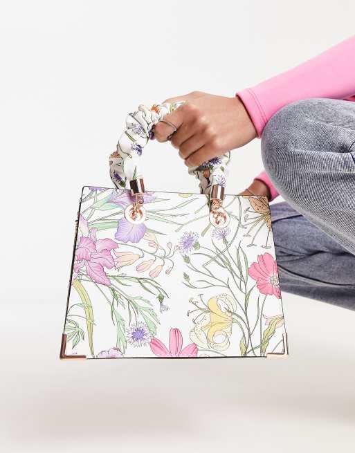Aldo floral design top handle bag with twisted handle in multi