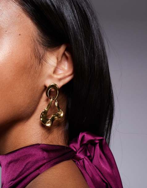 ALDO - Glowup - Waterbestendige oorknopjes van roestvrij staal met gesmolten ontwerp in goudkleur - view 1