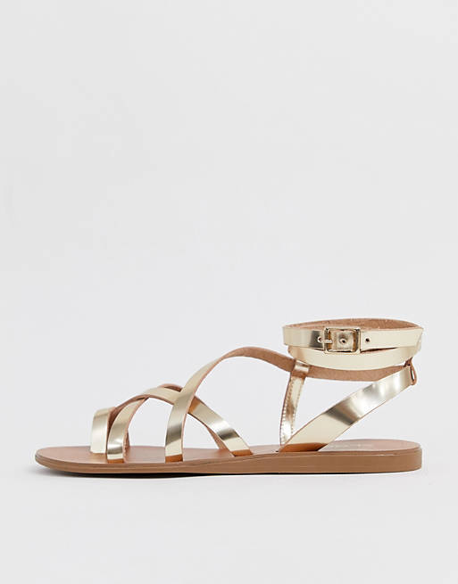 ALDO Gludda leather strappy toe loop sandal in gold | ASOS