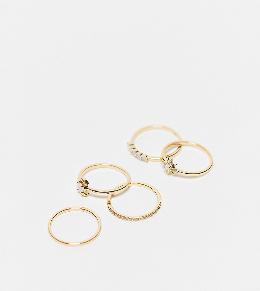 ALDO gold plated 5 pack of rings with moon and star in gold