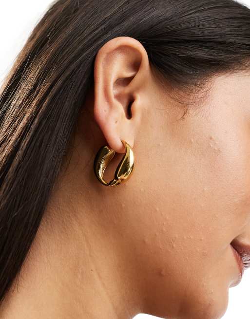 ALDO – Goldfarbene Creolen aus Edelstahl im geschmolzenen Design