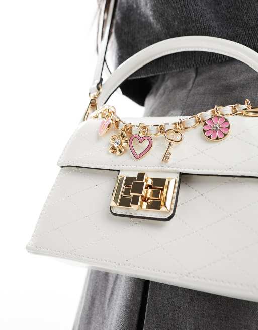 ALDO Haven top handle bag with charm detail in white ASOS