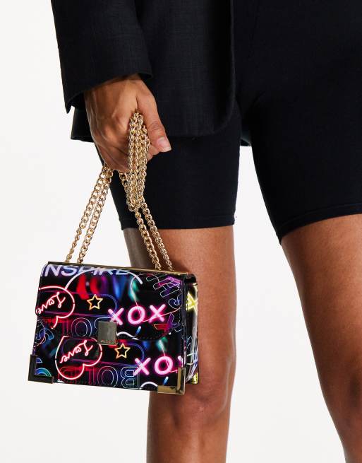 ALDO Juberra cross body bag in neon graffiti design ASOS