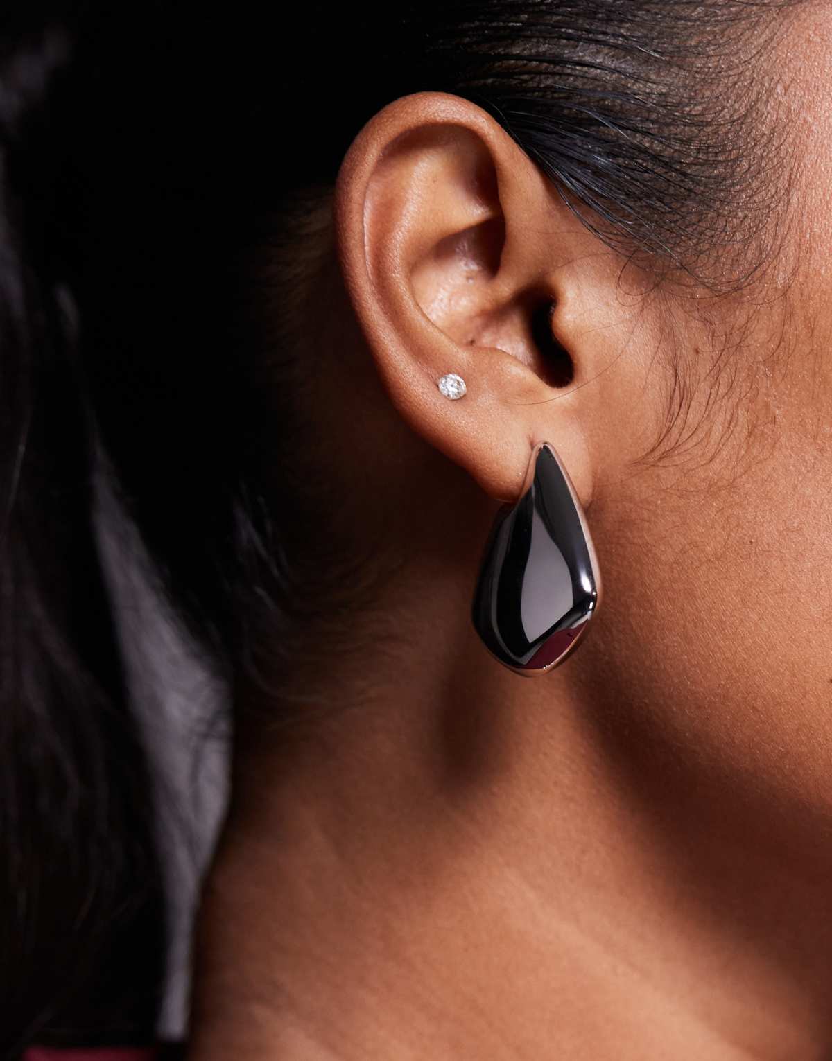 ALDO Koby stainless steel water resistant molten tear drop earrings in silver