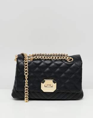 black quilted bag gold chain