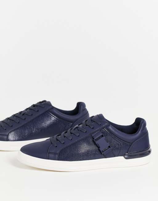 Aldo - Minimalistische sneakers met veters en gesp in zwart