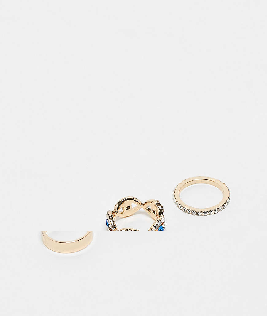 ALDO multi 3 pack of rings with eye and glass stone detail in gold