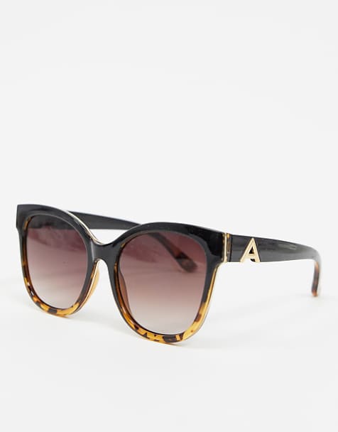 Les lunettes de soleil yeux de chat noires de Caroline Les lunettes de soleil yeux de chat noires de Caroline