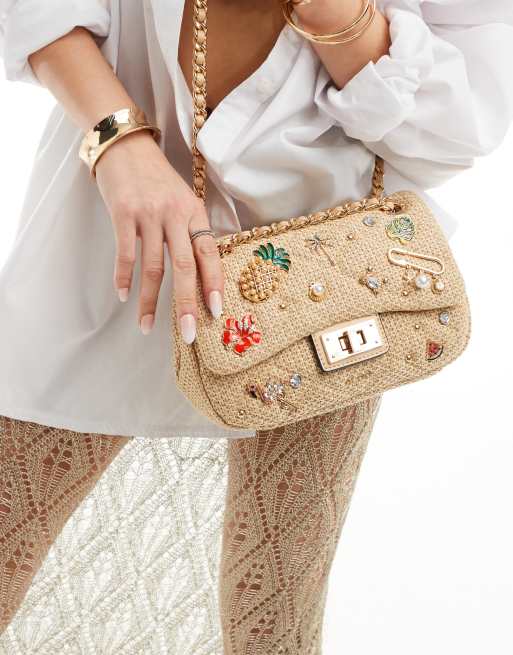 ALDO – Paradisa – Torebka crossbody z rafii z zawieszkami z motywem lata 