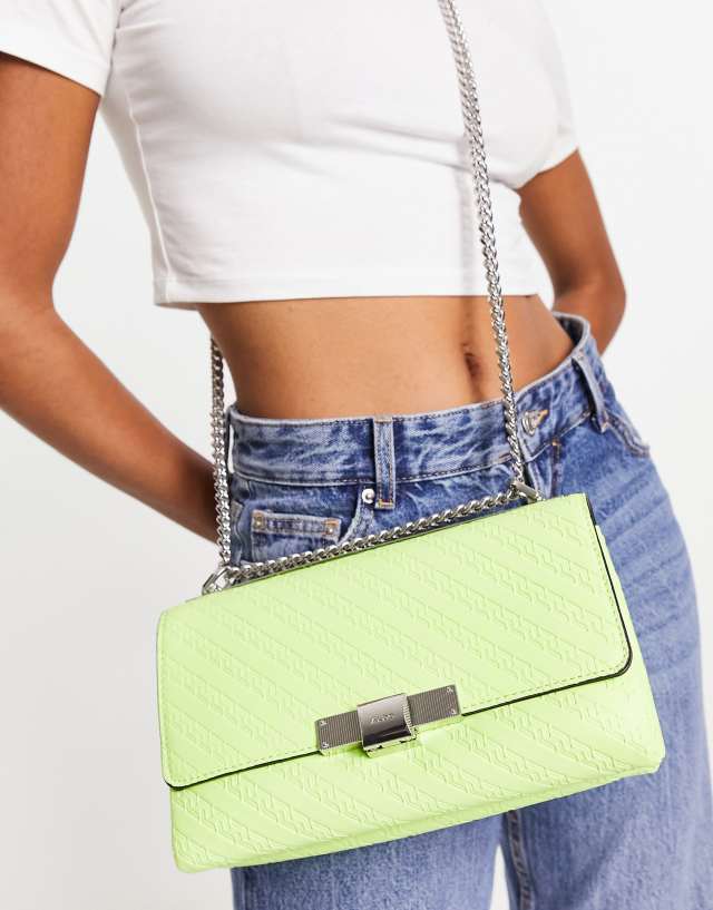 ALDO Schema crossbody bag with monogram in lime