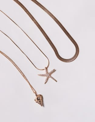 Aldo Seacharm Multirow Necklace With Starfish Pendant In Gold