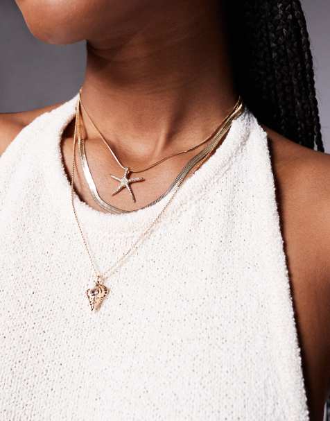 ALDO – Seacharm – Wielorzędowy naszyjnik łańcuszkowy w kolorze złota z zawieszkami w kształcie rozgwiazdy - view 1