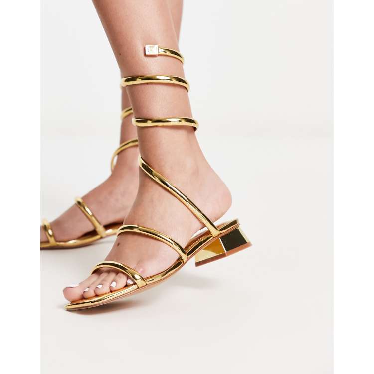 ALDO Spinna wrap around sandals in gold mirror ASOS