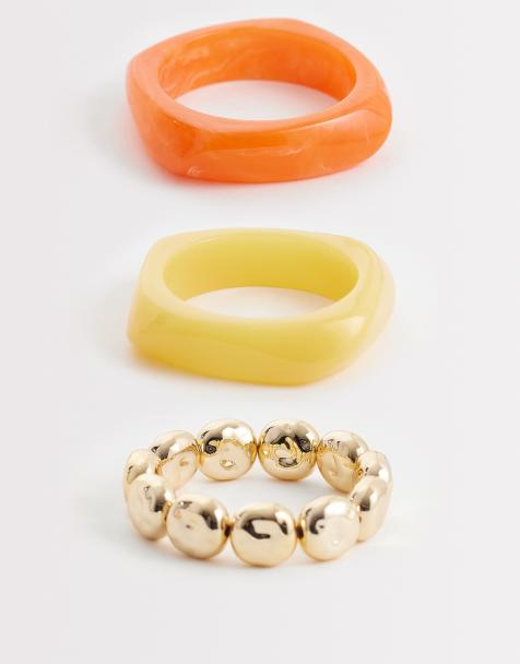 ALDO sunvibes layering bangles in orange, yellow and gold tone - view 1