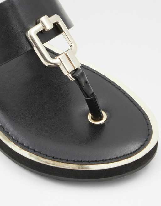 ALDO – Tatyx – Flache Sandalen mit Zehensteg und Metalldetail in Schwarz , 3 von 4