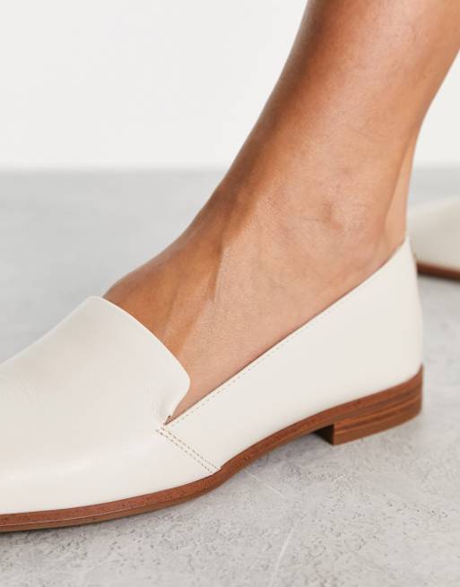 White slip on store loafers