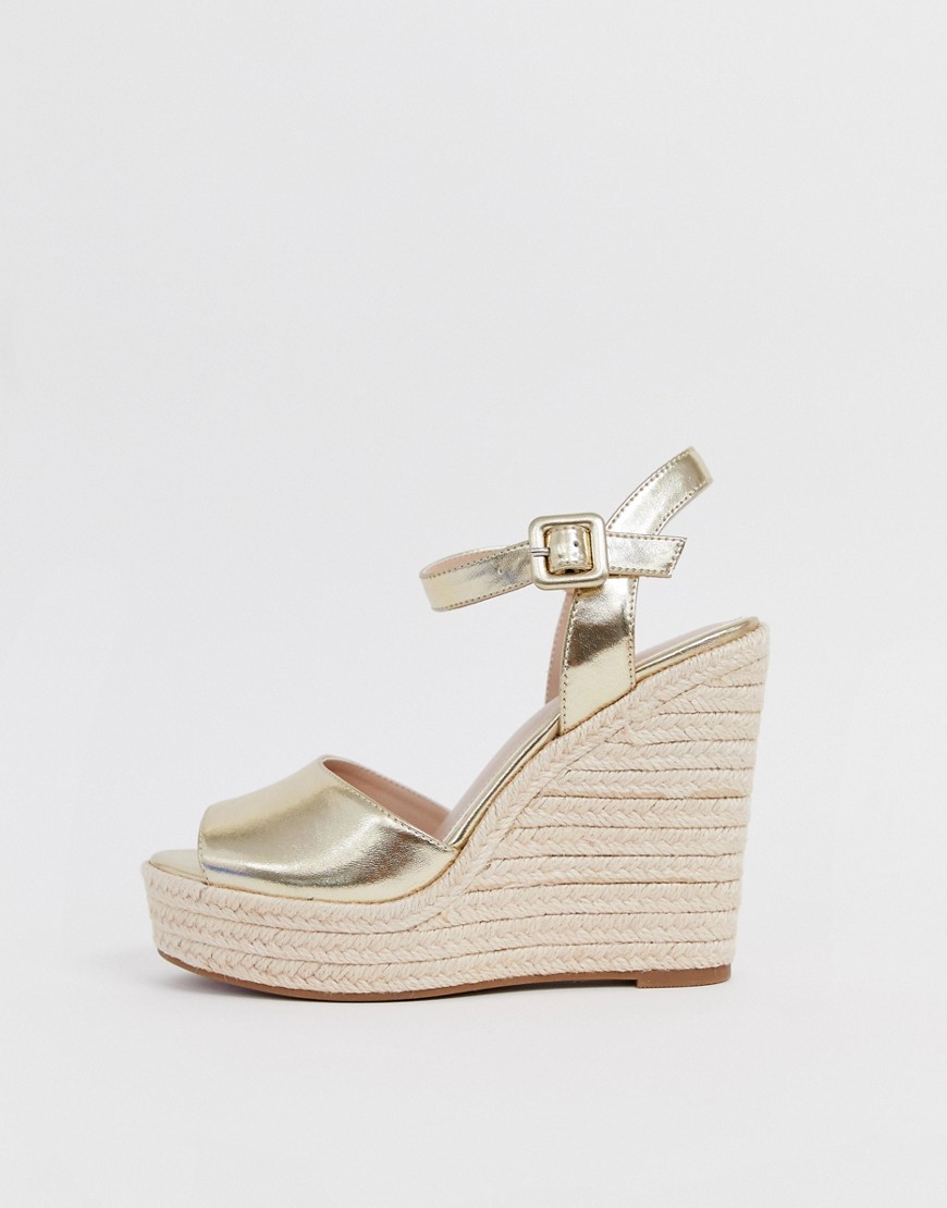 ALDO – Ybelani – Guldfärgade sandaler med kilklack
