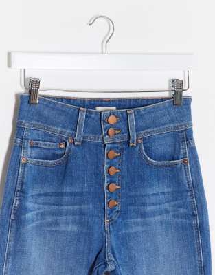 high rise exposed button jeans