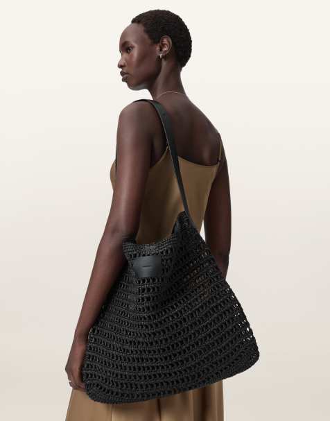 AllSaints Asha woven straw mesh shoulder bag in black - view 1