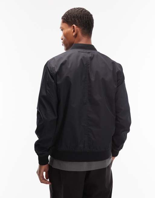 AllSaints Bassett reversible logo bomber jacket in black/green | ASOS