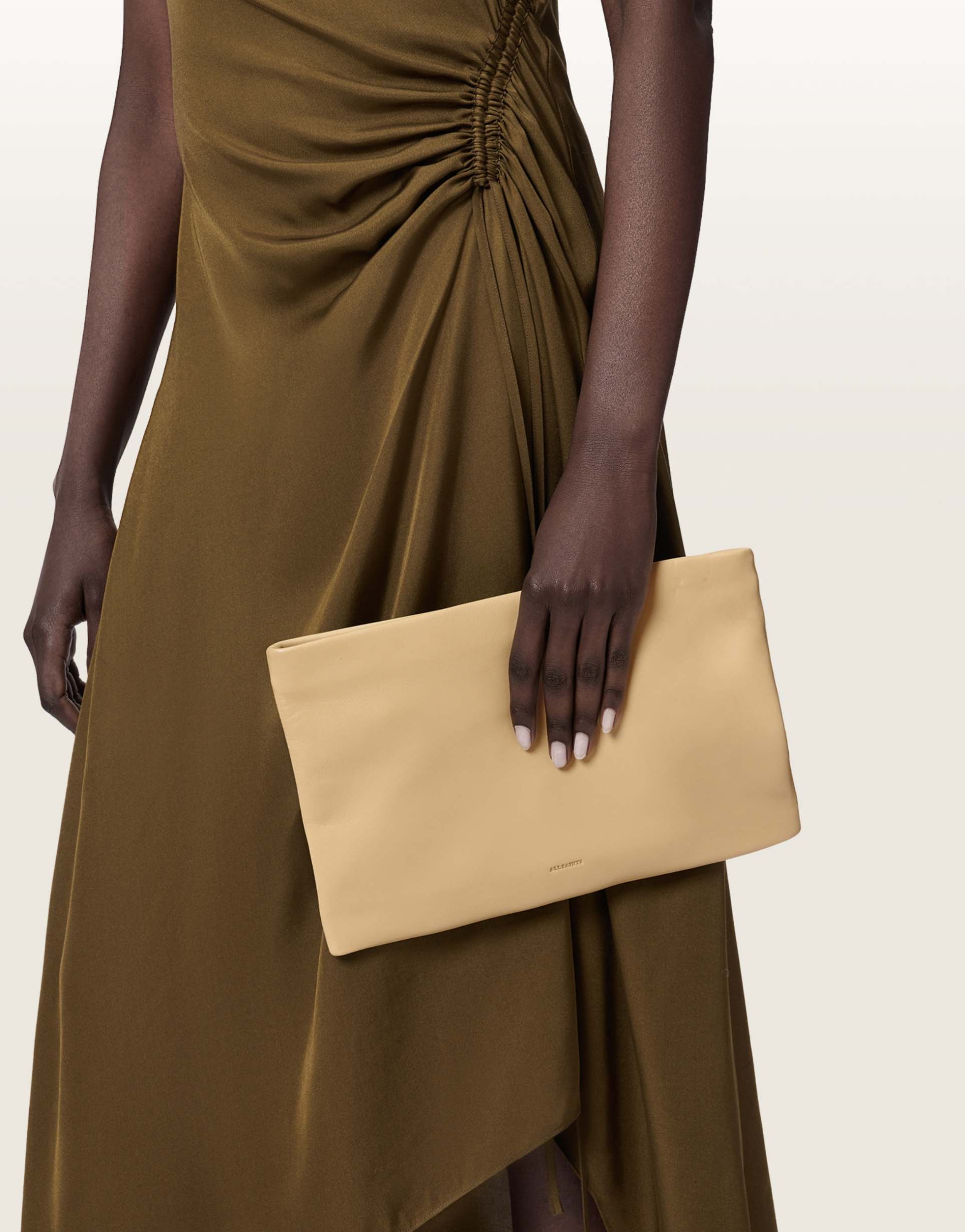 allsaints bettina lambs leather clutch bag in pale yellow