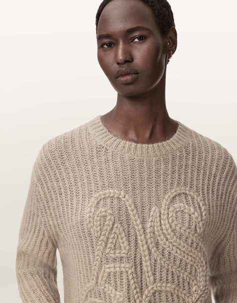 AllSaints – Chain – Pullover in Gerstenweiß mit „AS“-Motiv - view 1