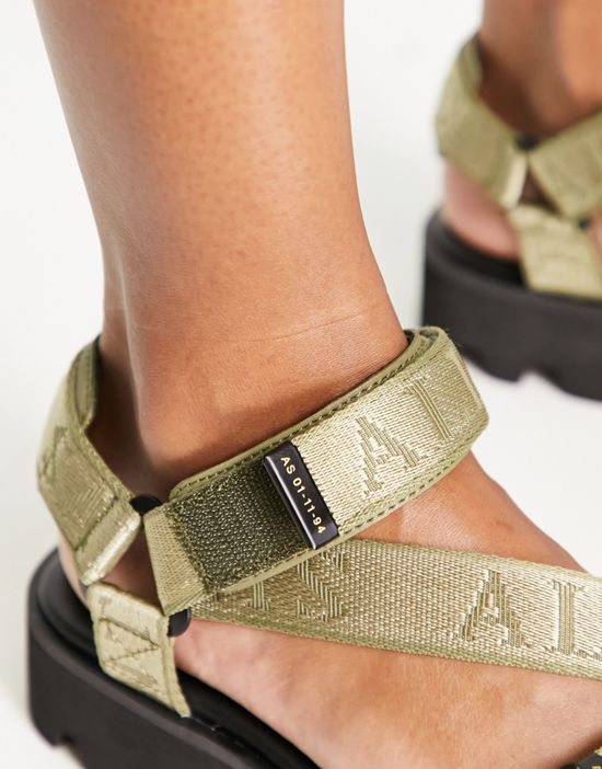 https://images.asos-media.com/products/allsaints-chunky-sandals-with-tonal-logo-straps-in-olive/203932156-3?$n_550w$&wid=550&fit=constrain