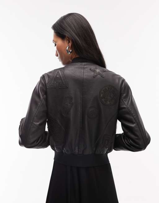 AllSaints cropped orten 94 patch leather bomber jacket in black | ASOS