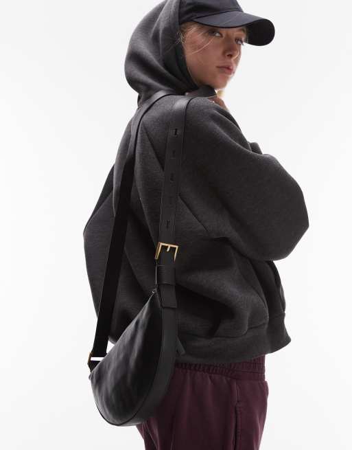 AllSaints – Czarna skórzana torebka crossbody w kształcie półksiężyca