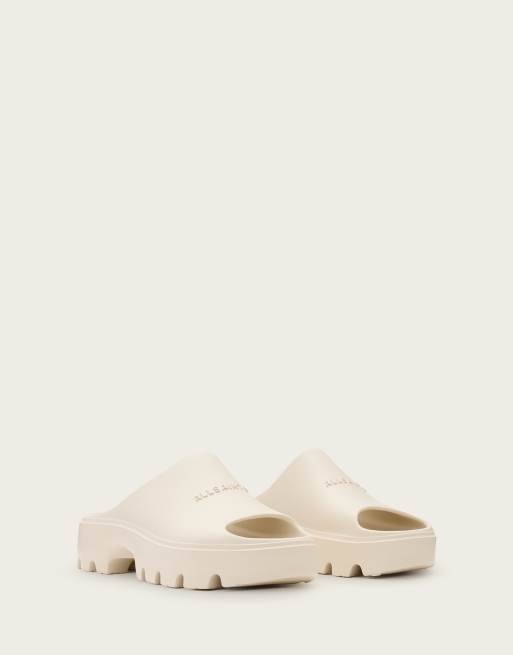 AllSaints – Eclipse – Vita platåsandaler i gummi