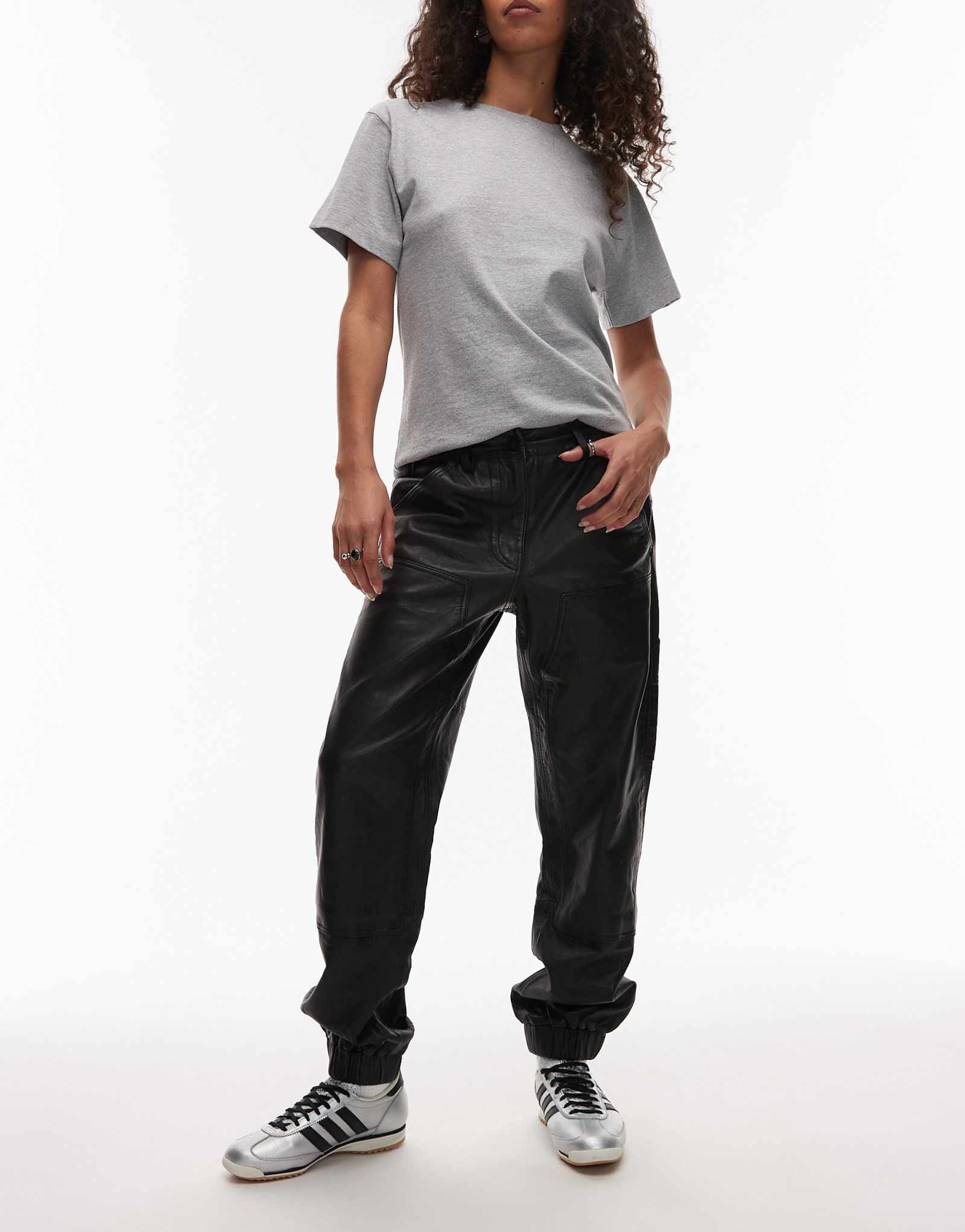 Брюки из плотницкой кожи Allsaints El черного цвета 