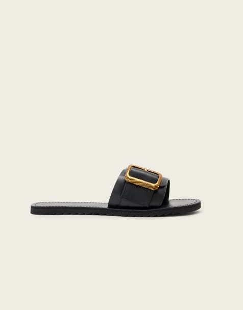 AllSaints Ella chunky buckle one strap leather slides in black - view 1