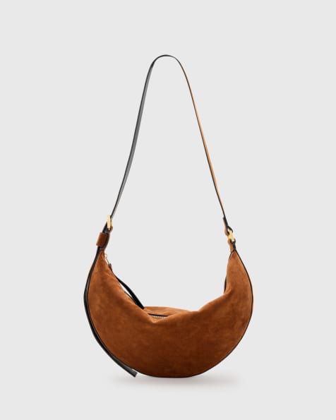AllSaints halfmoon suede shoulder bag in cognac brown - view 1