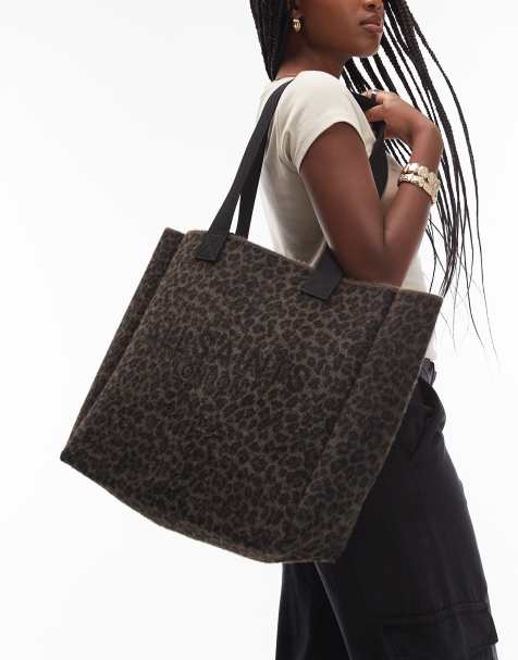 AllSaints Izzy fuzzy leopard tote bag in brown / black - view 1