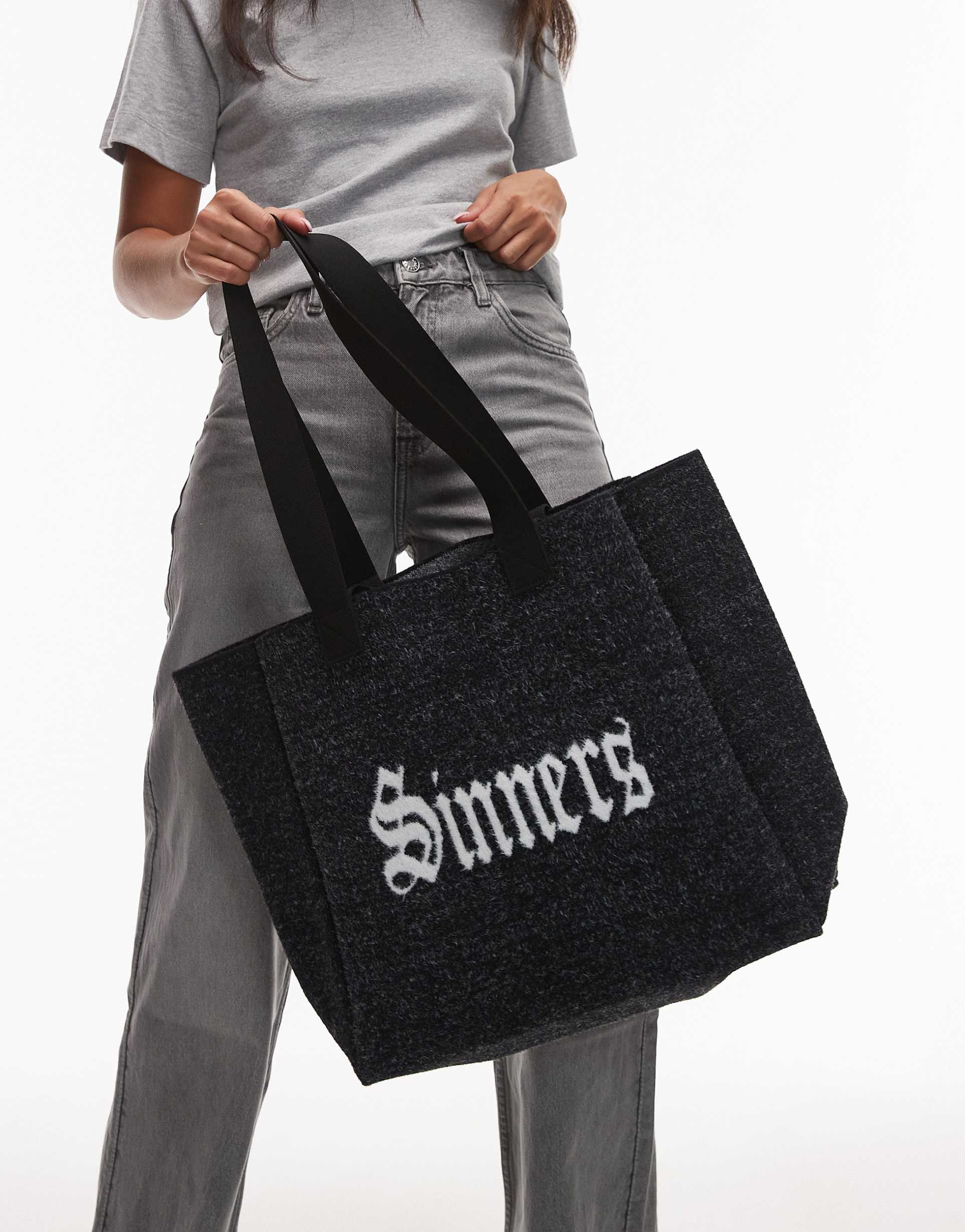 allsaints izzy fuzzy saint logo tote bag in black
