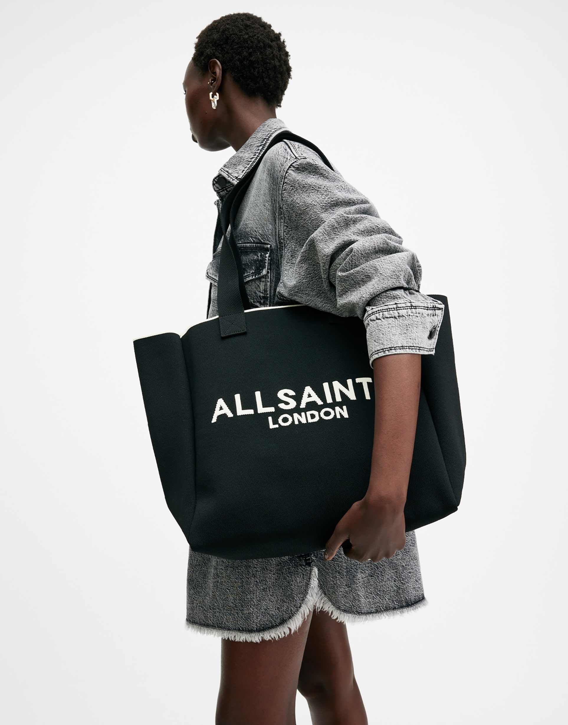 allsaints izzy large knit tote bag in black