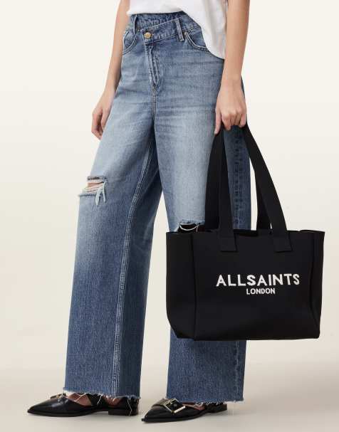 AllSaints – Izzy – Mittelgroße Tragetasche in Schwarz mit Logo - view 1