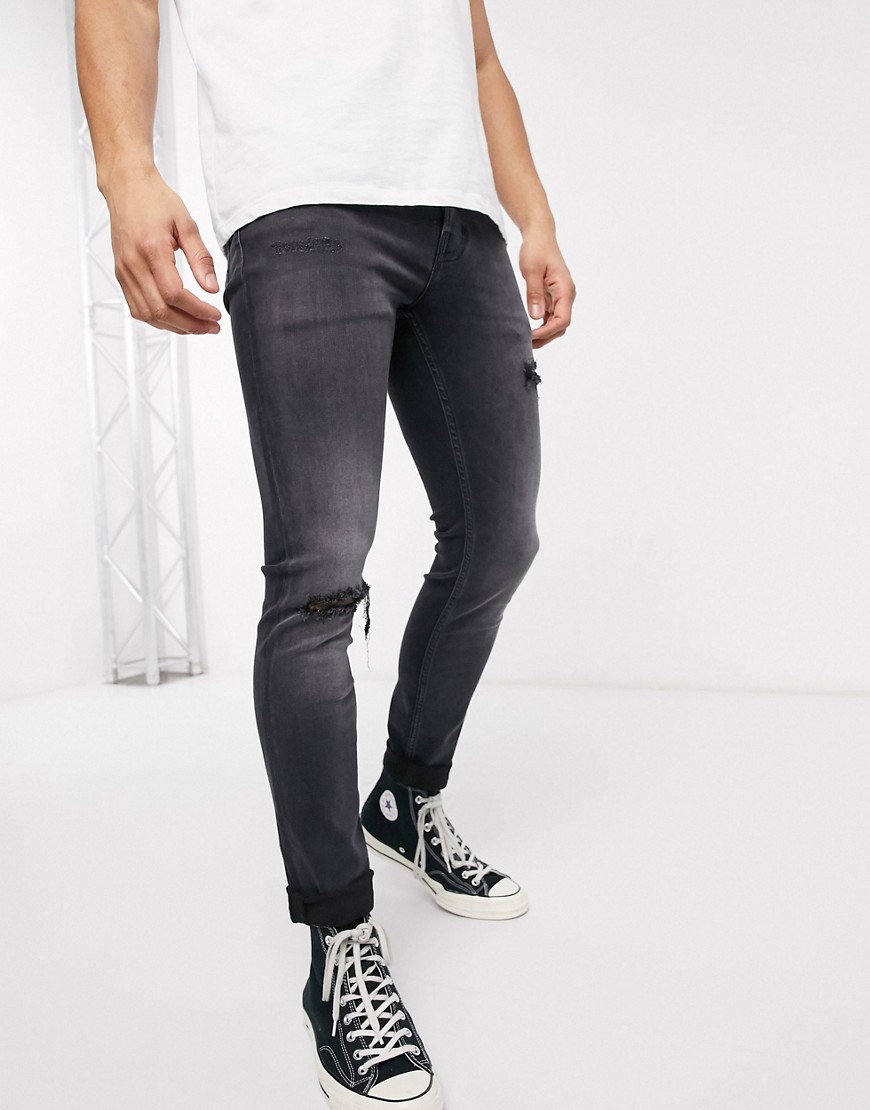 AllSaints - Jeans a sigaretta nero slavato con abrasioni